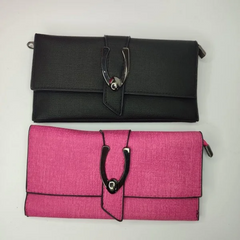 Стильний класичний гаманець з металевою вставкою: у чорному та рожевому кольорах.